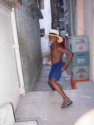 My friend Doug wearing my hat in the Favela (Slums)